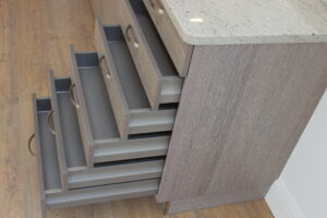 Luxury German kitchen drawers with modern wood finish